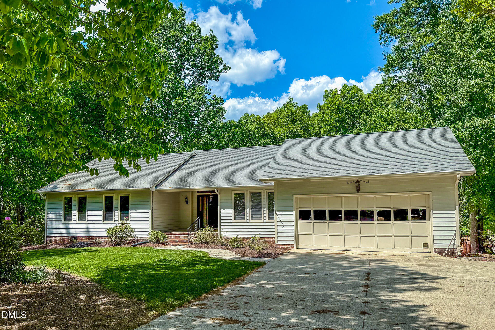 11 Denada Path Roxboro, NC 27574 - Photo 62 of 62 a front view of a house with a garden