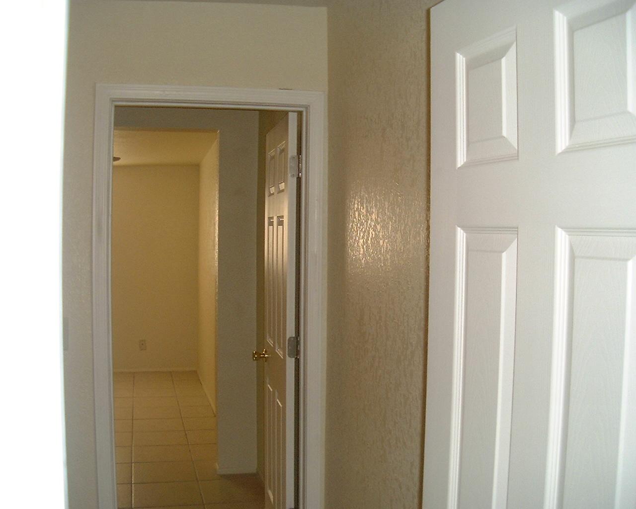 6027 West Osborn Road Phoenix, AZ 85033 - Photo 8 of 18 From Den to Master Bedroom