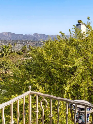 an empty room with a wooden cabinet