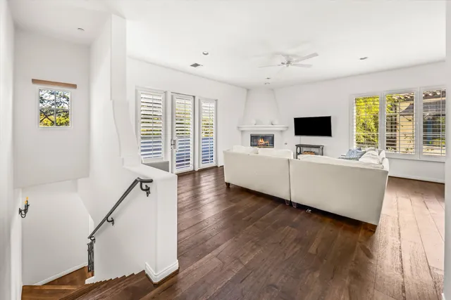 a kitchen with white cabinets and a stove top oven
