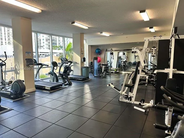 a view of a room with gym equipment
