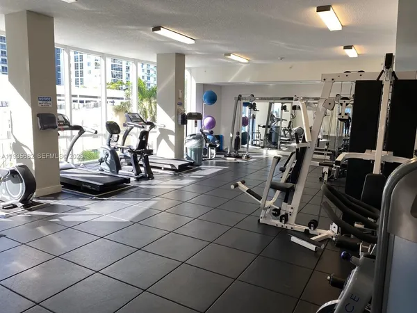 a view of a room with gym equipment