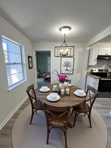 a view of a dining room with furniture