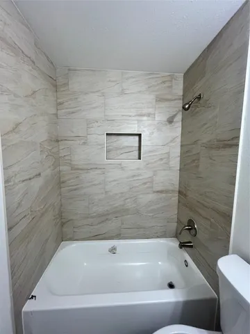 a bathroom with a bathtub