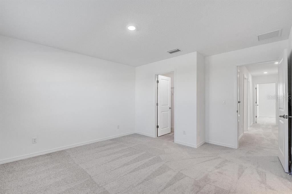 3035 Novara Lane Lakewood Ranch, FL 34211 - Photo 16 of 18 a view of an empty room