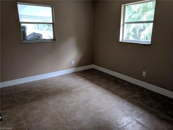 an empty room with a window