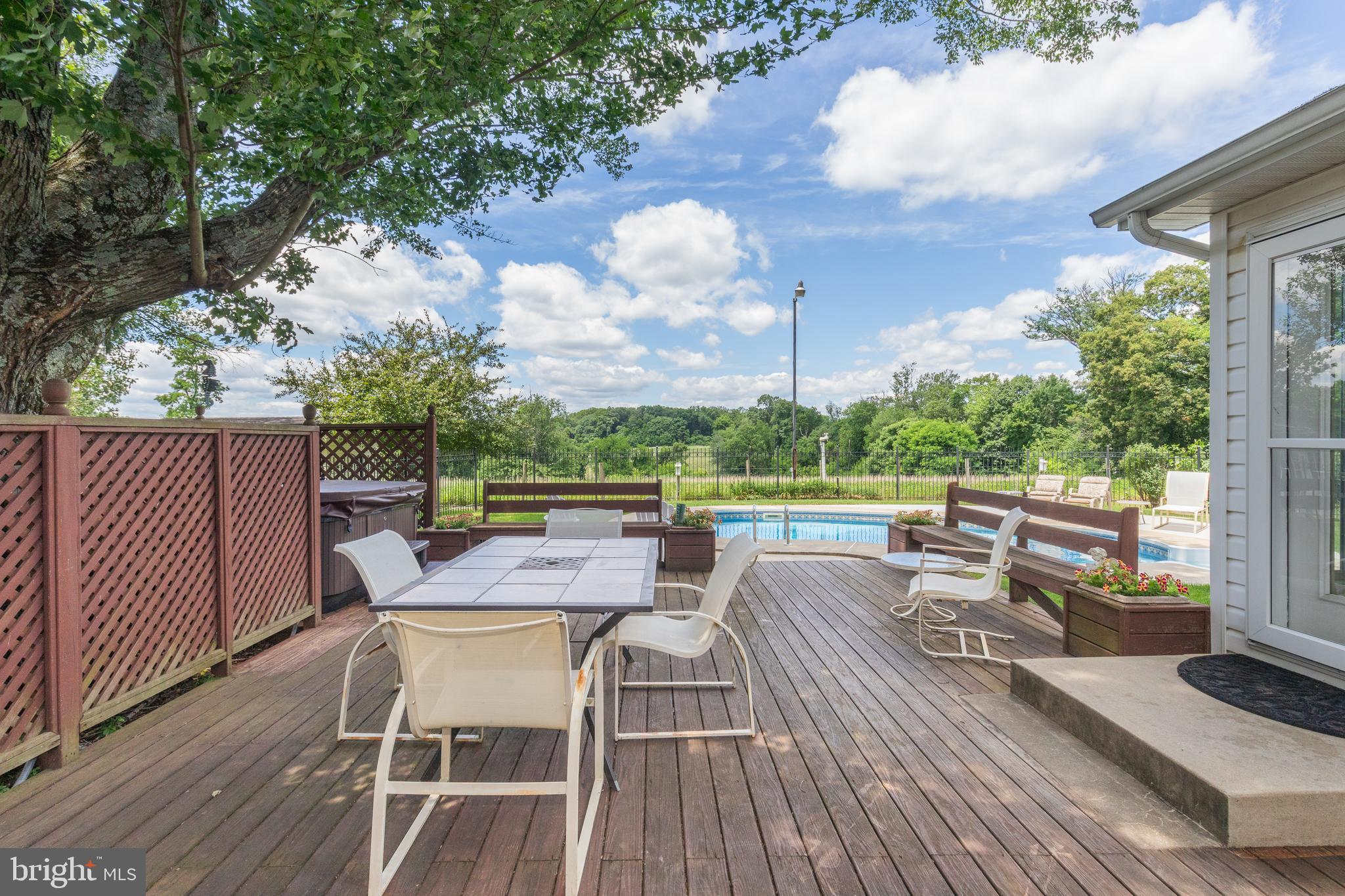 22520 Peach Tree Road Boyds, MD 20841 - Photo 42 of 50 Spacious deck for enjoying sunset views