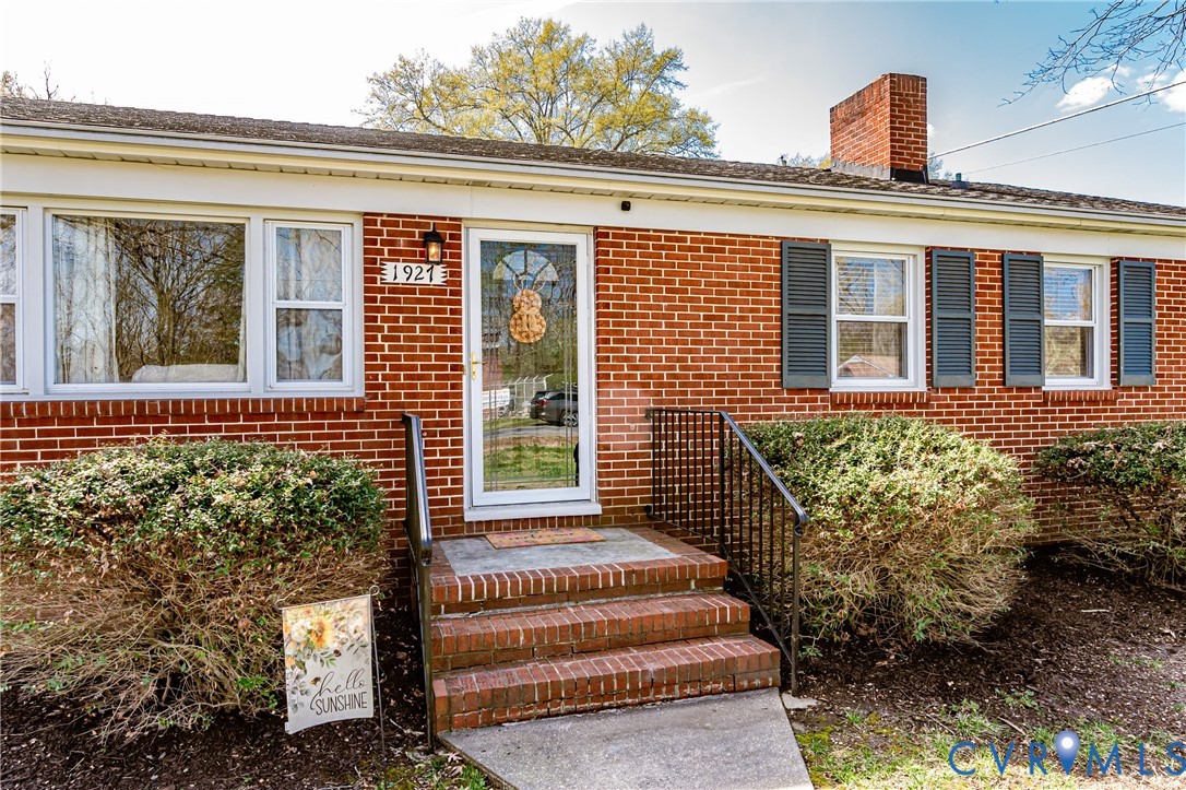 1927 F Street West Point, VA 23181 - Photo 2 of 59 a front view of a house with a garden