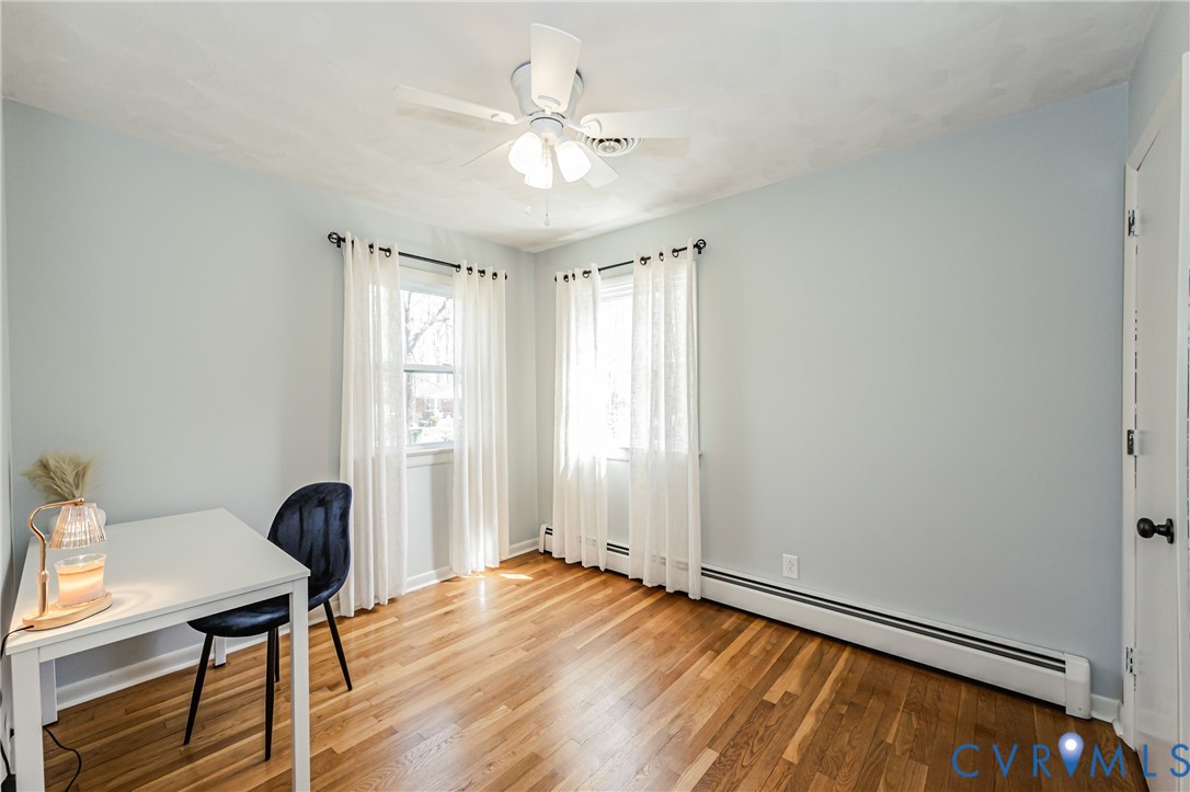 1927 F Street West Point, VA 23181 - Photo 41 of 59 a view of a workspace with furniture and a window