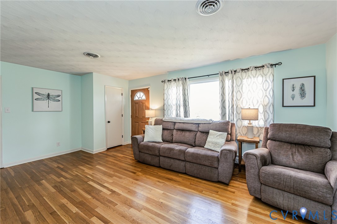 1927 F Street West Point, VA 23181 - Photo 5 of 59 a living room with furniture and a window