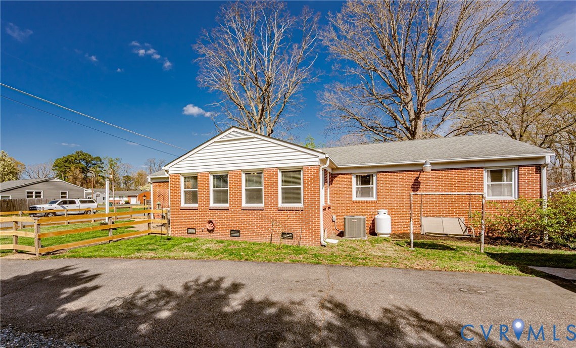 1927 F Street West Point, VA 23181 - Photo 58 of 59 a front view of a house with a yard and garage