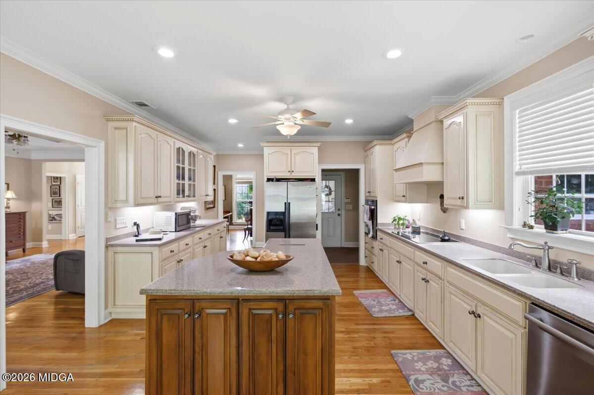 210 Oberon Place Macon, GA 31210 - Photo 14 of 31 a kitchen with counter top space cabinets and stainless steel appliances