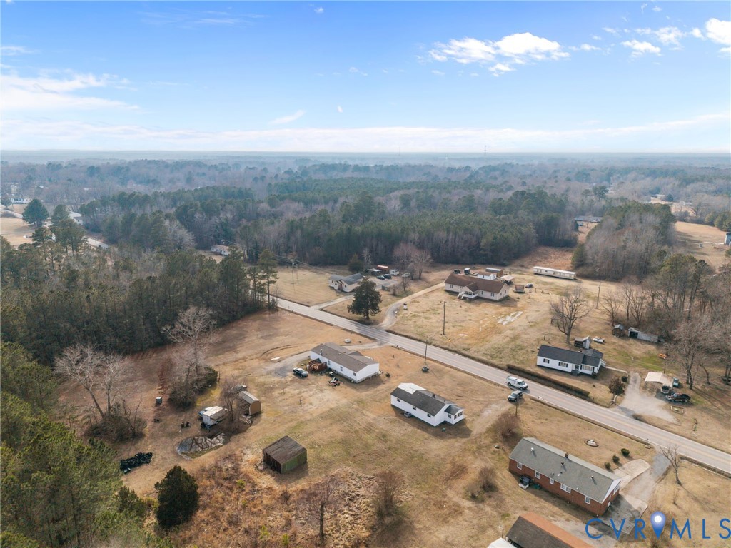 10187 Birch Island Road Wakefield, VA 23888 - Photo 2 of 41 an aerial view of residential houses with outdoor space