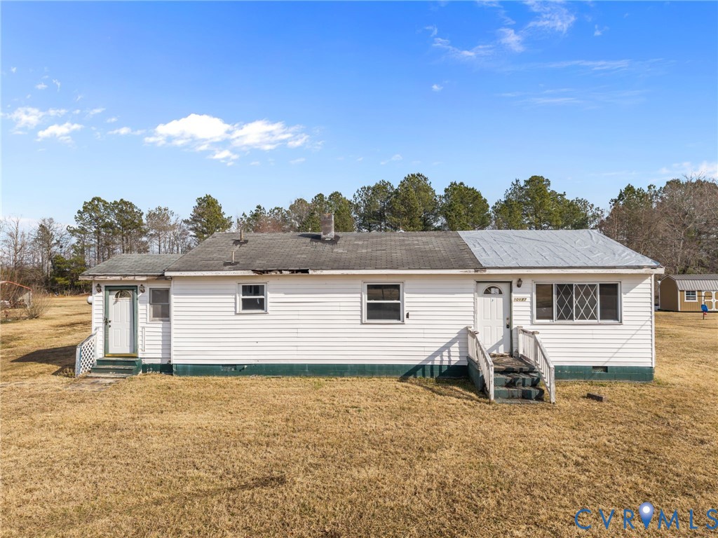 10187 Birch Island Road Wakefield, VA 23888 - Photo 25 of 41 front view of house with a yard