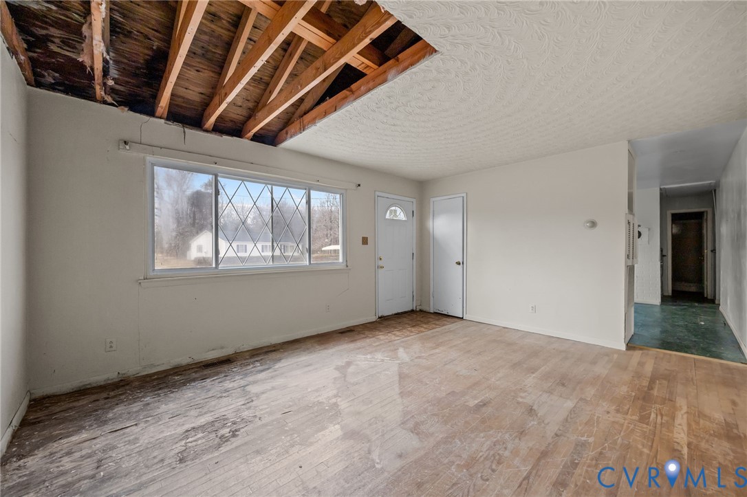 10187 Birch Island Road Wakefield, VA 23888 - Photo 27 of 41 a view of an empty room with a window