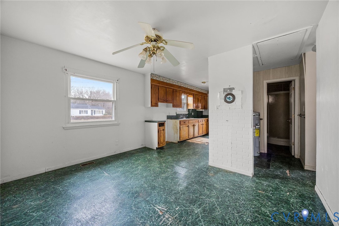 10187 Birch Island Road Wakefield, VA 23888 - Photo 28 of 41 a view of a room with window and cabinet