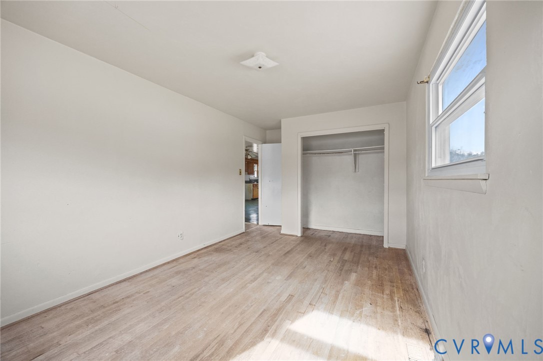 10187 Birch Island Road Wakefield, VA 23888 - Photo 32 of 41 a view of an empty room and window