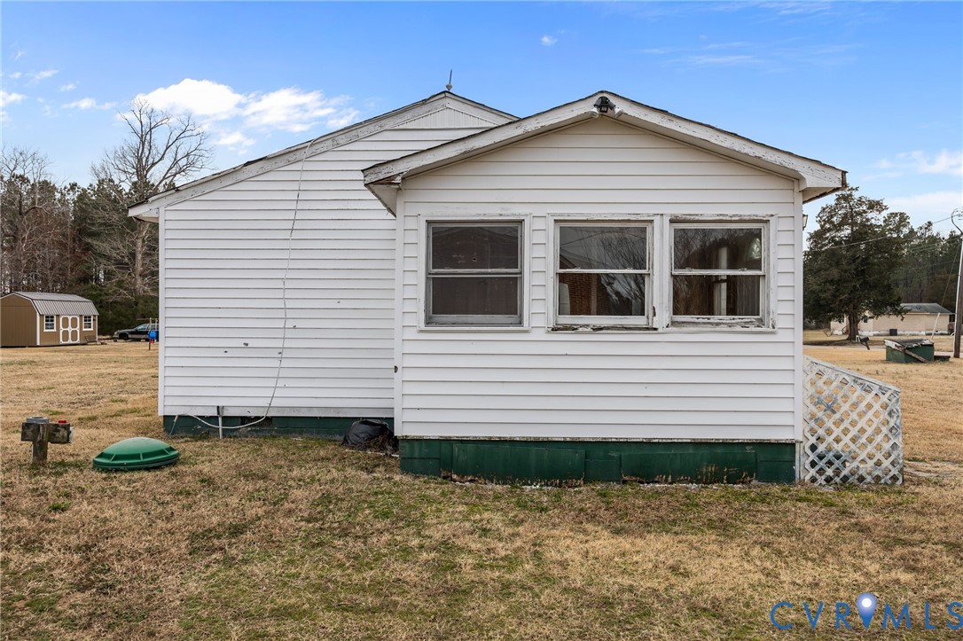 10187 Birch Island Road Wakefield, VA 23888 - Photo 10 of 41 a view of a house with a yard