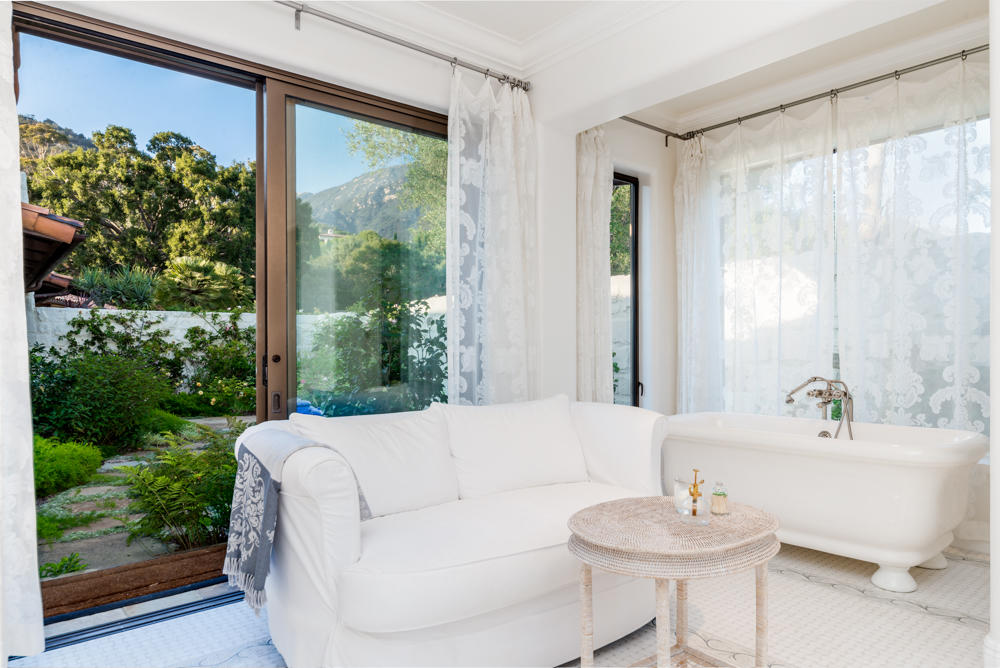 881 San Ysidro Lane Montecito, CA 93108 - Photo 19 of 78 a living room with furniture and a large window
