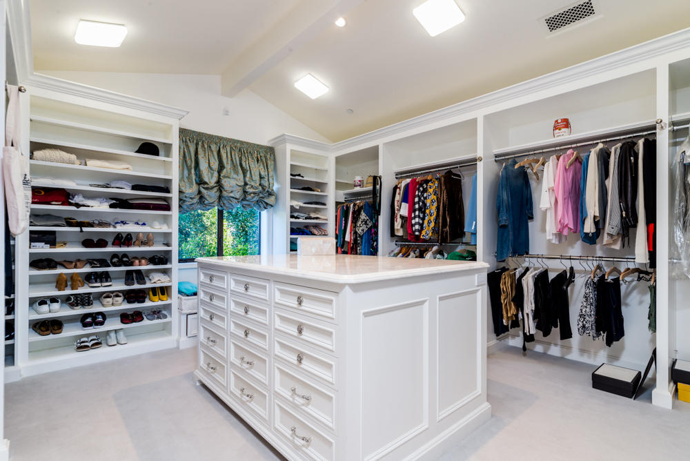 881 San Ysidro Lane Montecito, CA 93108 - Photo 20 of 78 a view of walk in closet with clothes and shoes