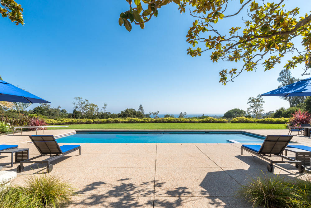 881 San Ysidro Lane Montecito, CA 93108 - Photo 2 of 78 a view of swimming pool with outdoor seating and a garden
