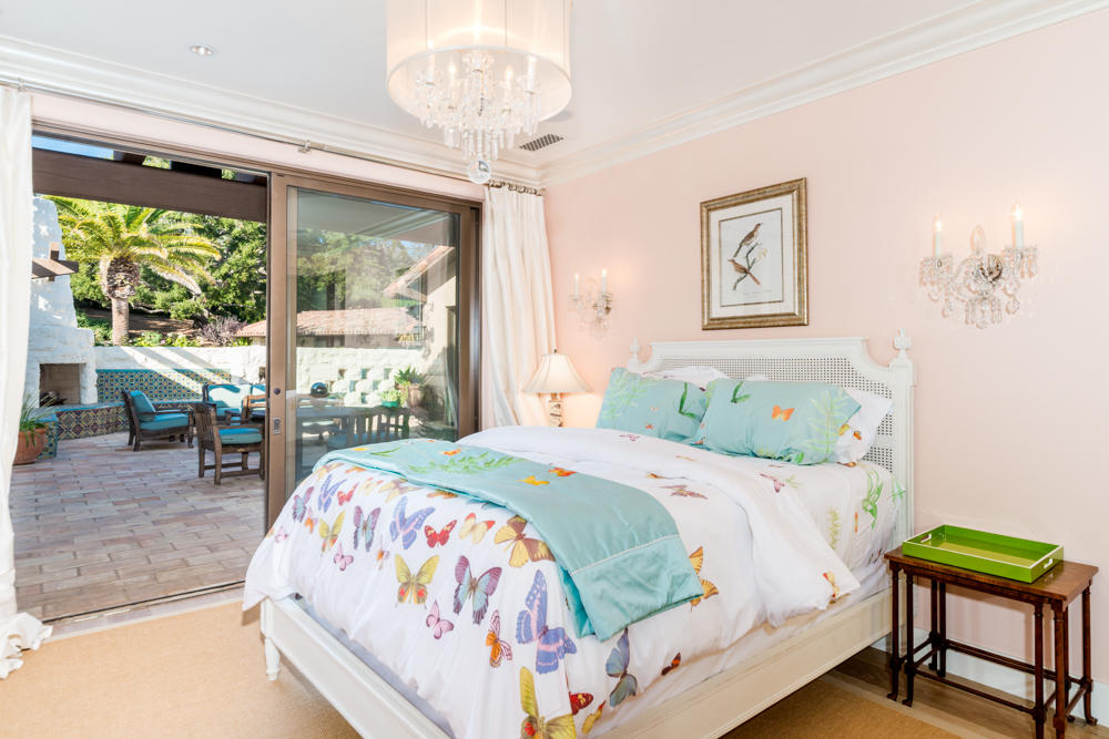 881 San Ysidro Lane Montecito, CA 93108 - Photo 35 of 78 a bedroom with a bed and a window