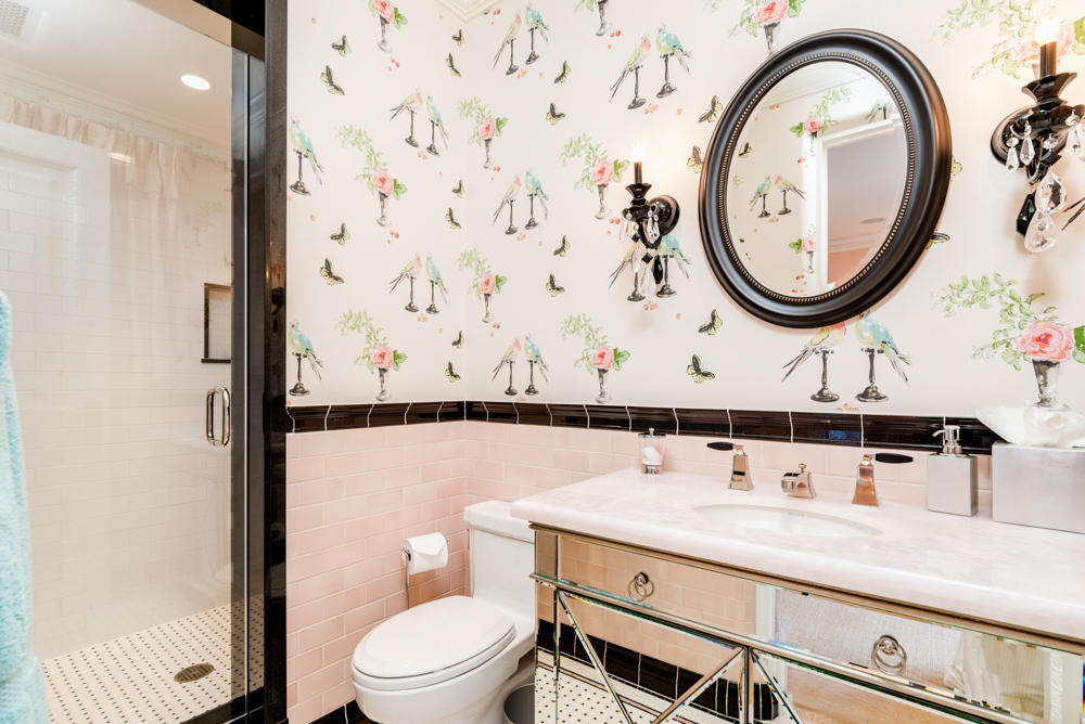 881 San Ysidro Lane Montecito, CA 93108 - Photo 36 of 78 a bathroom with a toilet a sink and a mirror