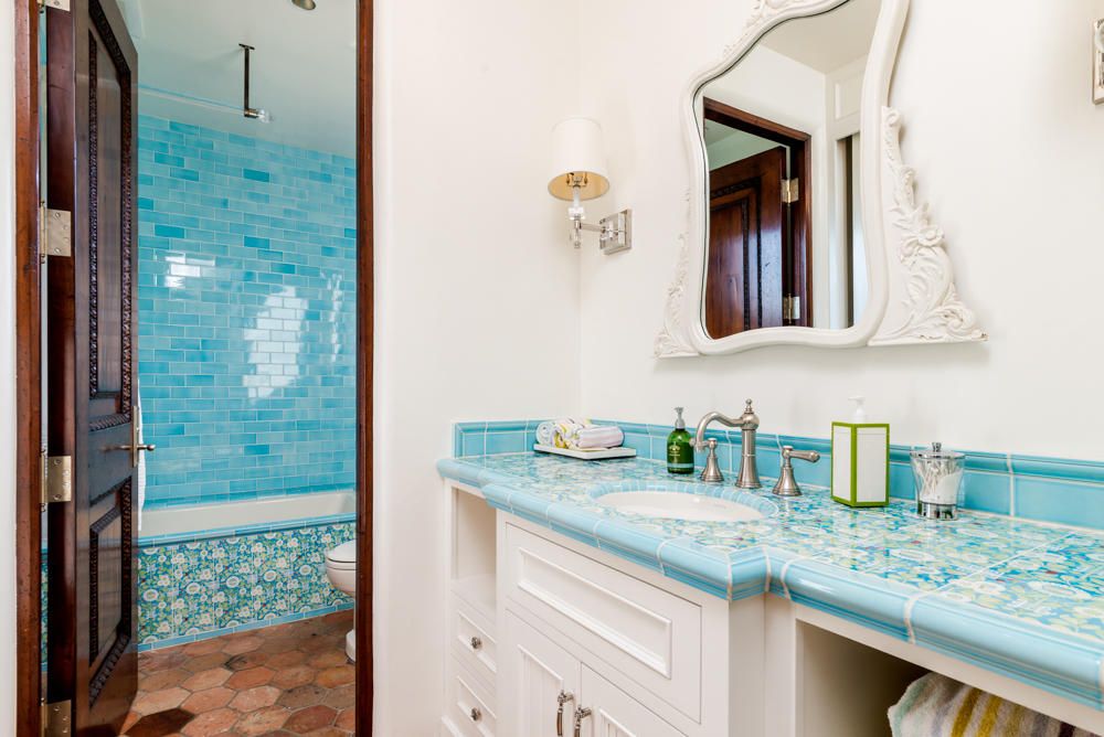 881 San Ysidro Lane Montecito, CA 93108 - Photo 38 of 78 a bathroom with a sink and a mirror