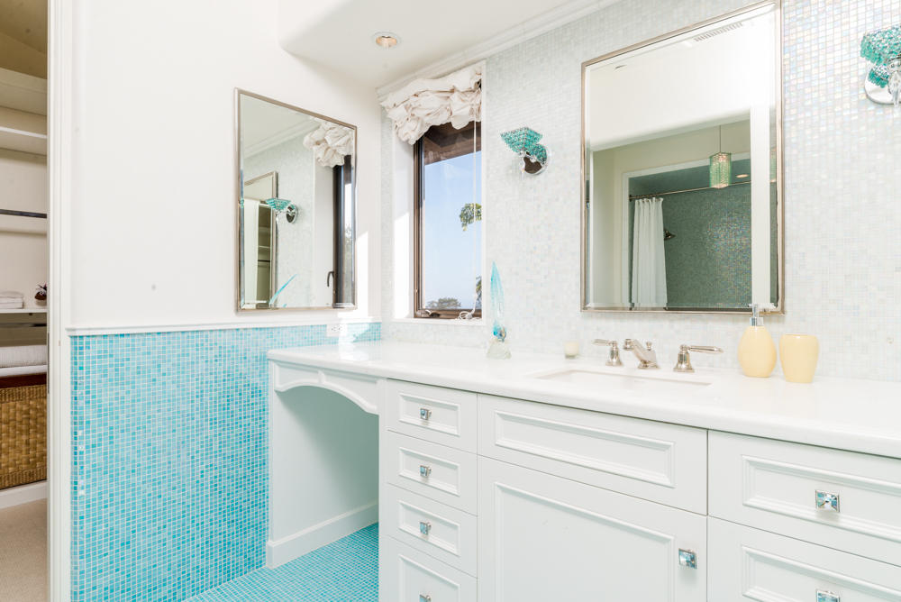 881 San Ysidro Lane Montecito, CA 93108 - Photo 47 of 78 a bathroom with a sink and a mirror
