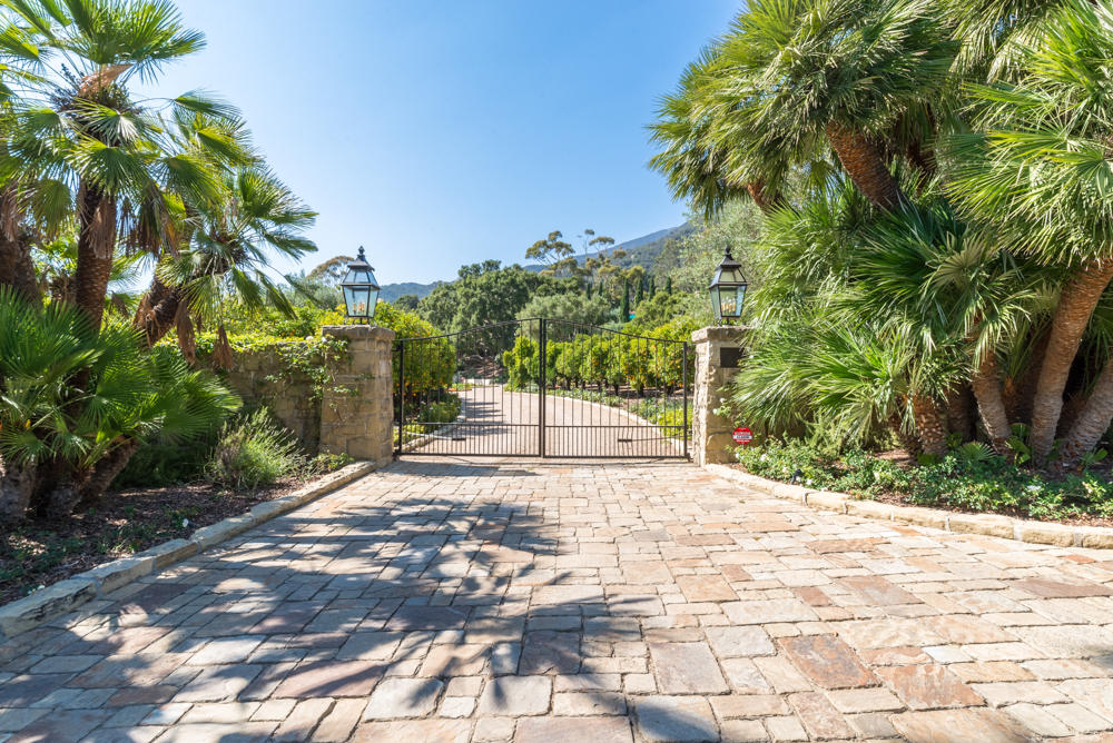 881 San Ysidro Lane Montecito, CA 93108 - Photo 7 of 78 a view of a yard with plants and trees