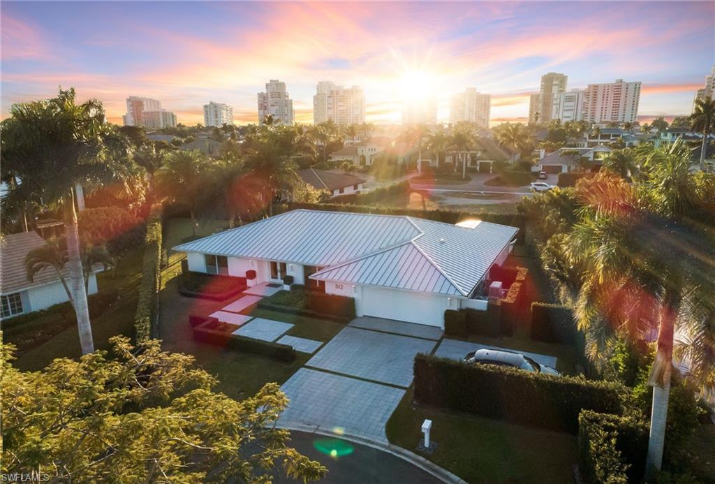 512 Neapolitan Lane Naples, FL 34103 - Photo 2 of 35 a view of a city with tall buildings