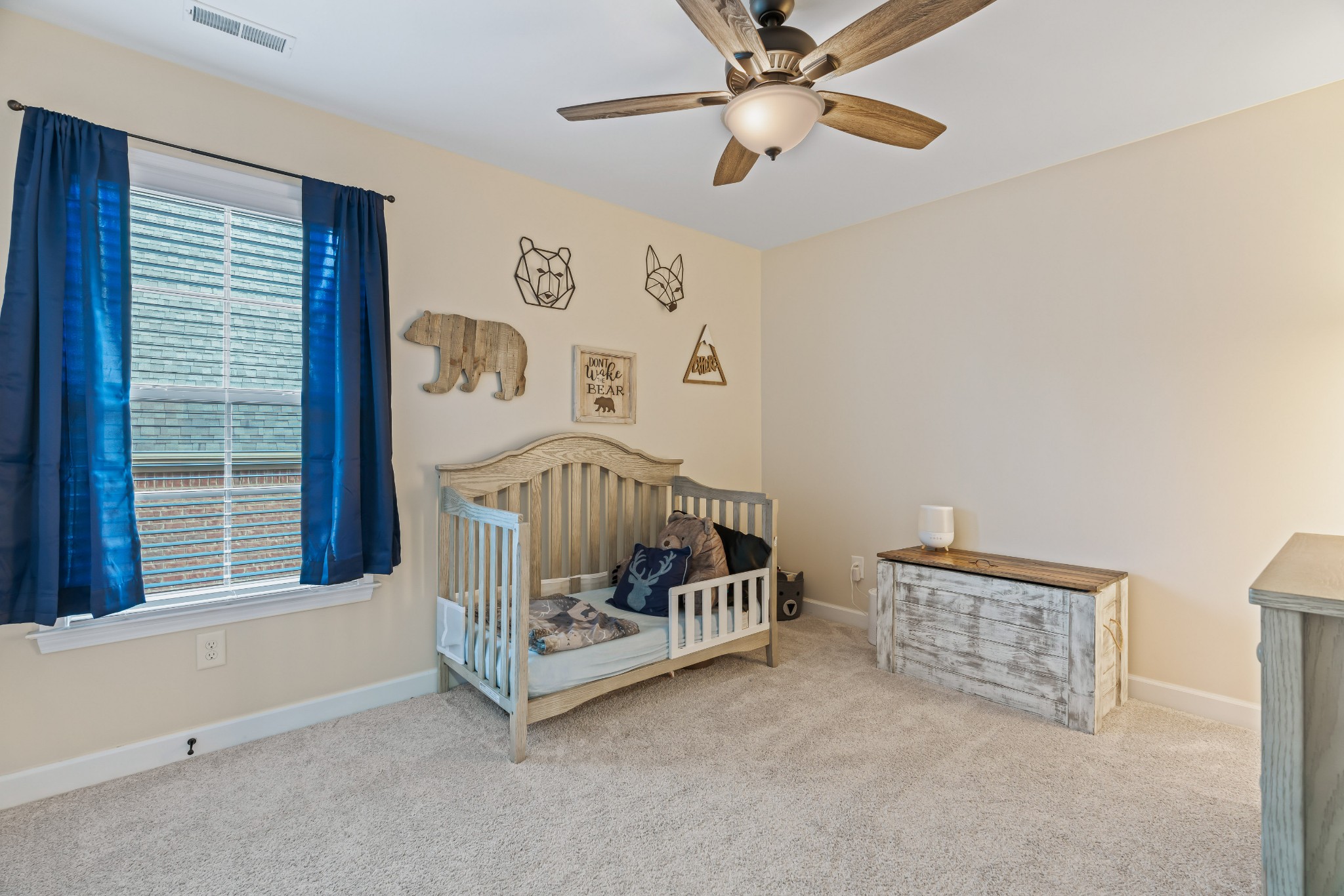 1003 Claymill Drive Spring Hill, TN 37174 - Photo 42 of 62 a bedroom with furniture and a large window