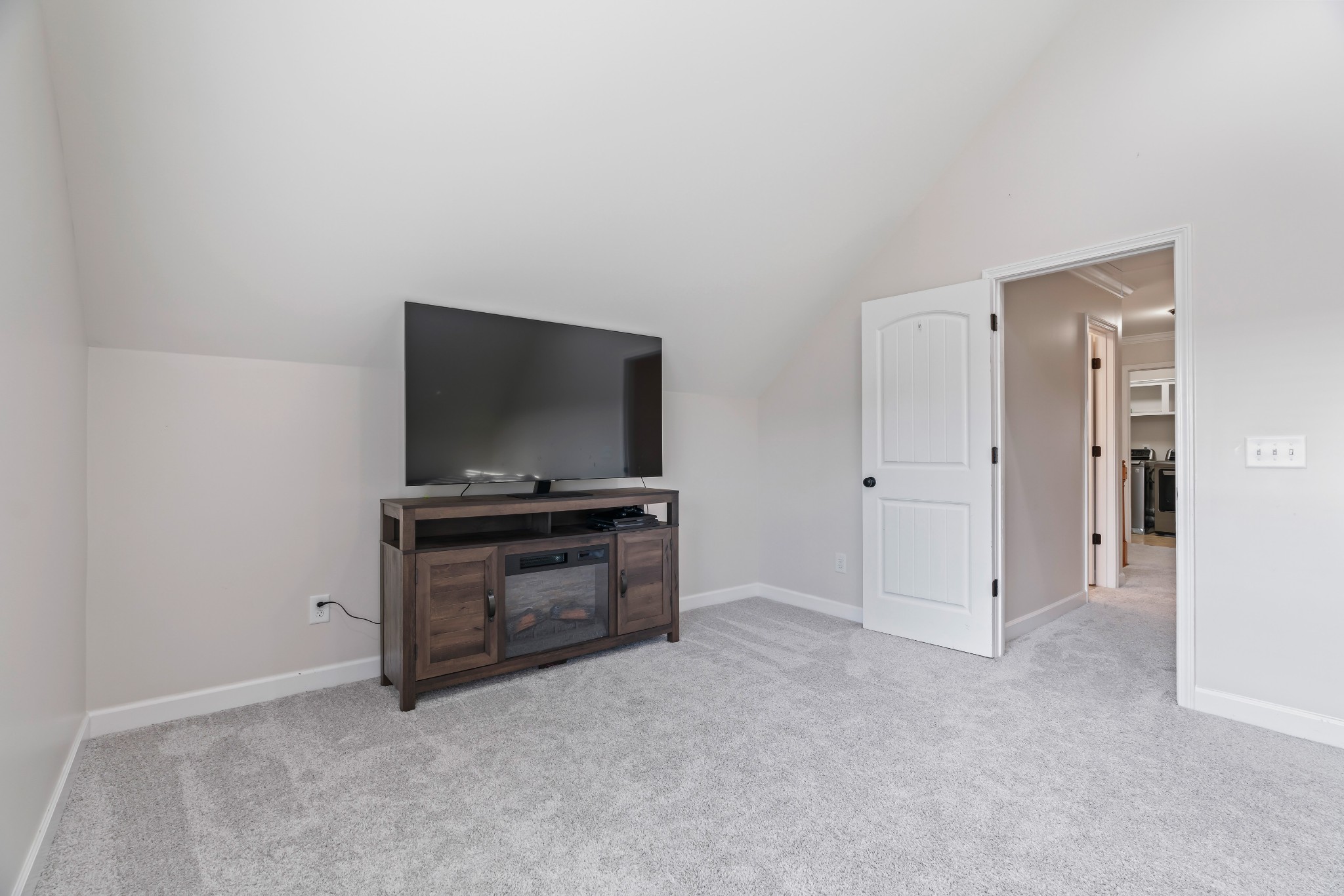 1003 Claymill Drive Spring Hill, TN 37174 - Photo 46 of 62 a living room with furniture and a flat screen tv