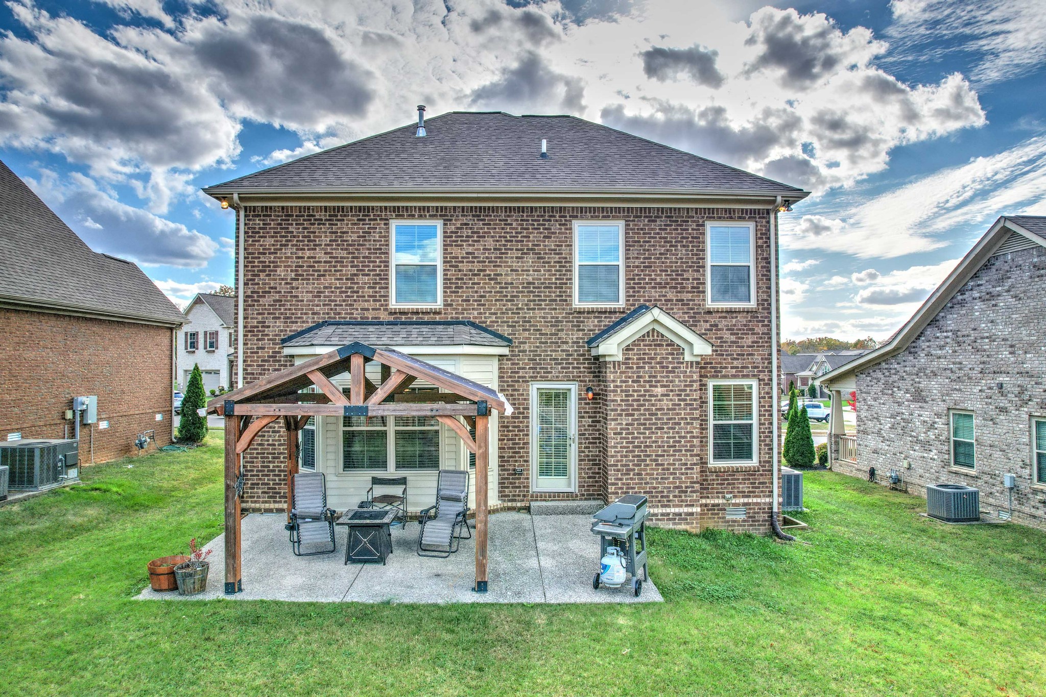 1003 Claymill Drive Spring Hill, TN 37174 - Photo 5 of 62 a front view of a house with a yard