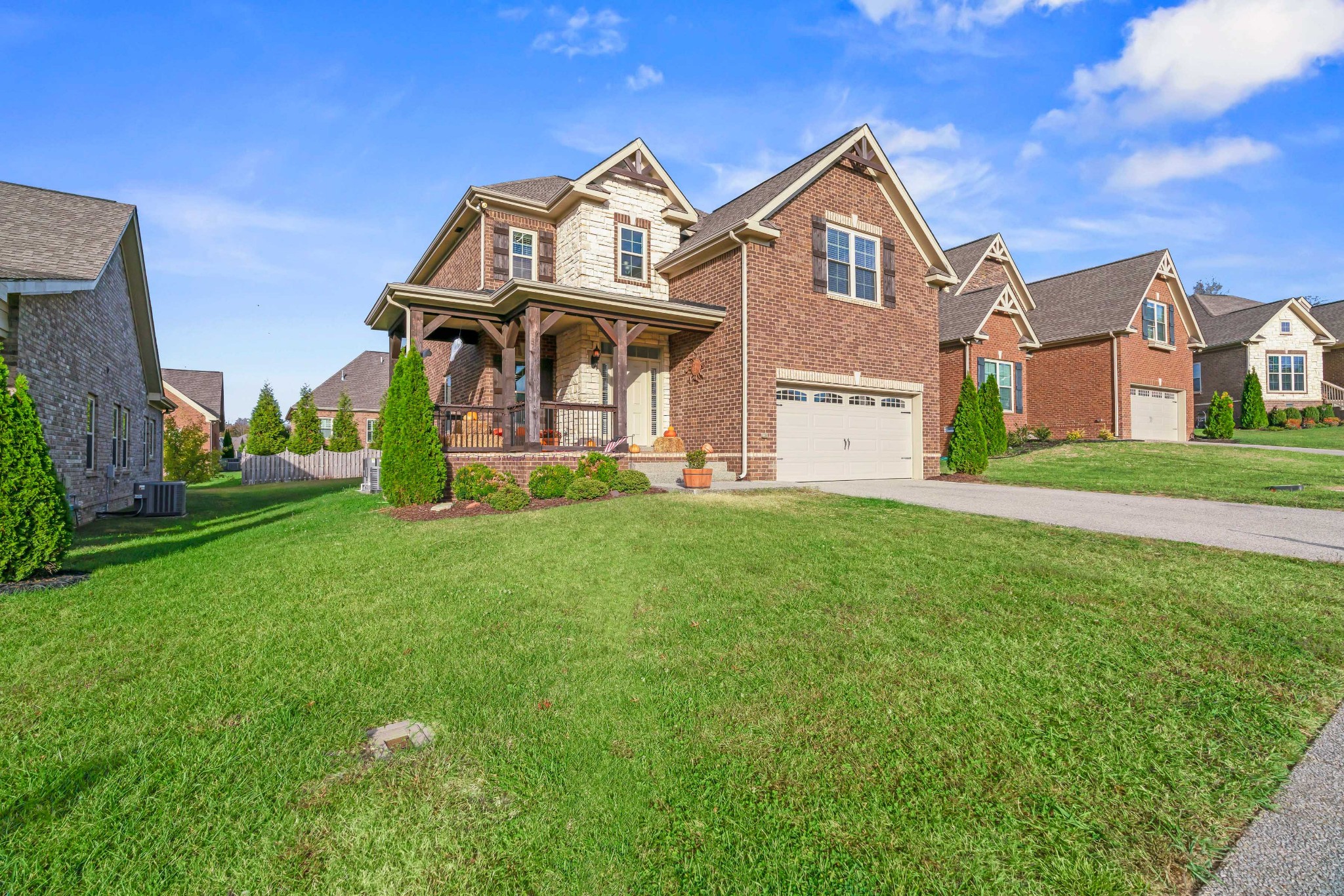 1003 Claymill Drive Spring Hill, TN 37174 - Photo 53 of 62 a front view of a house with a yard
