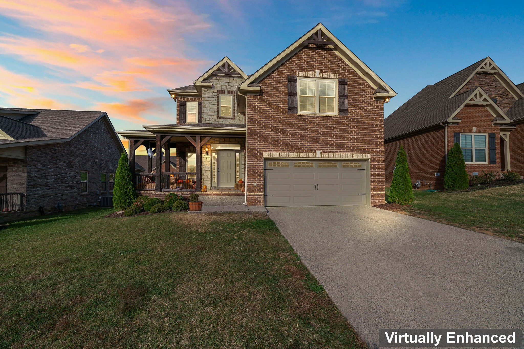 1003 Claymill Drive Spring Hill, TN 37174 - Photo 55 of 62 a front view of a house with a yard and garage