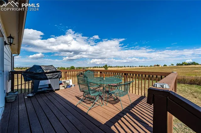 a view of a terrace with outdoor seating