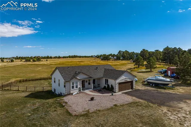 a view of a house with a ocean view