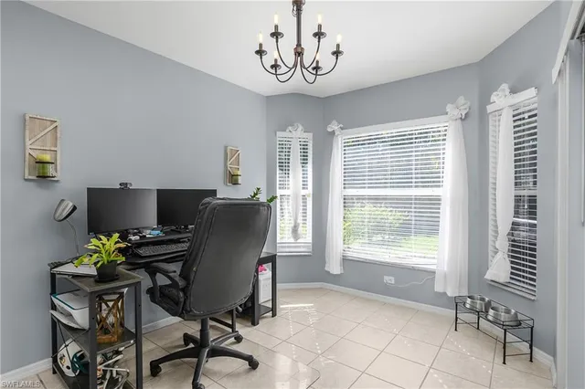 a bathroom with a sink mirror and toilet