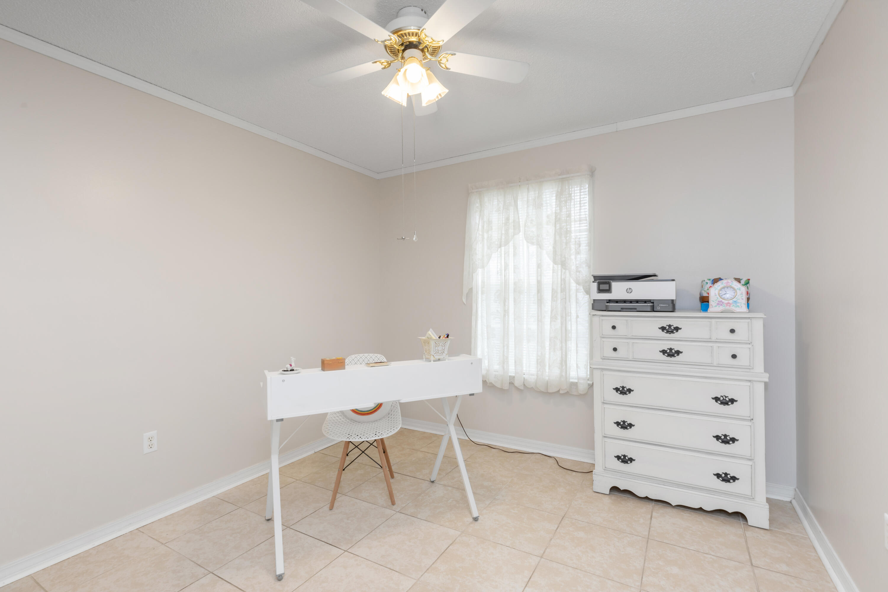 1244 Jefferyscot Drive Crestview, FL 32536 - Photo 29 of 40 a view of a workspace with furniture and a window