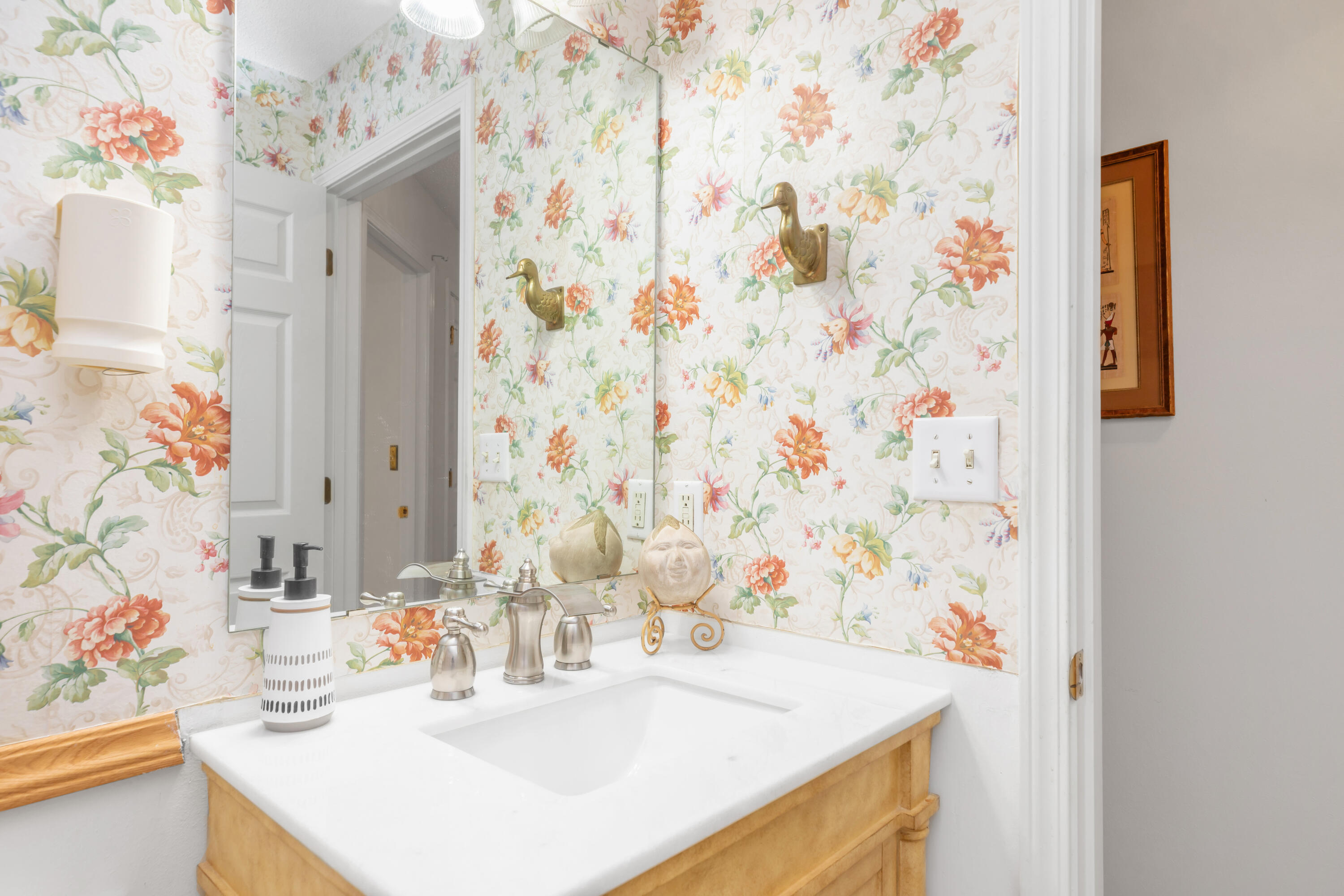 1244 Jefferyscot Drive Crestview, FL 32536 - Photo 33 of 40 a bathroom with a sink vanity and a mirror