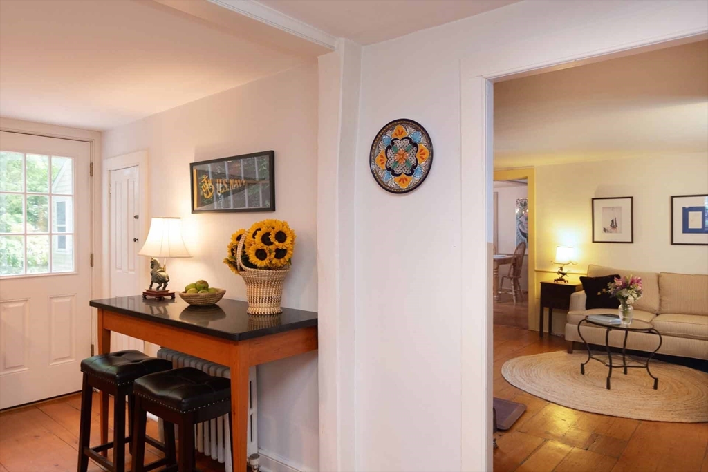 2 Green Avenue Edgartown, MA 02539 - Photo 12 of 42 a living room with couches and a table