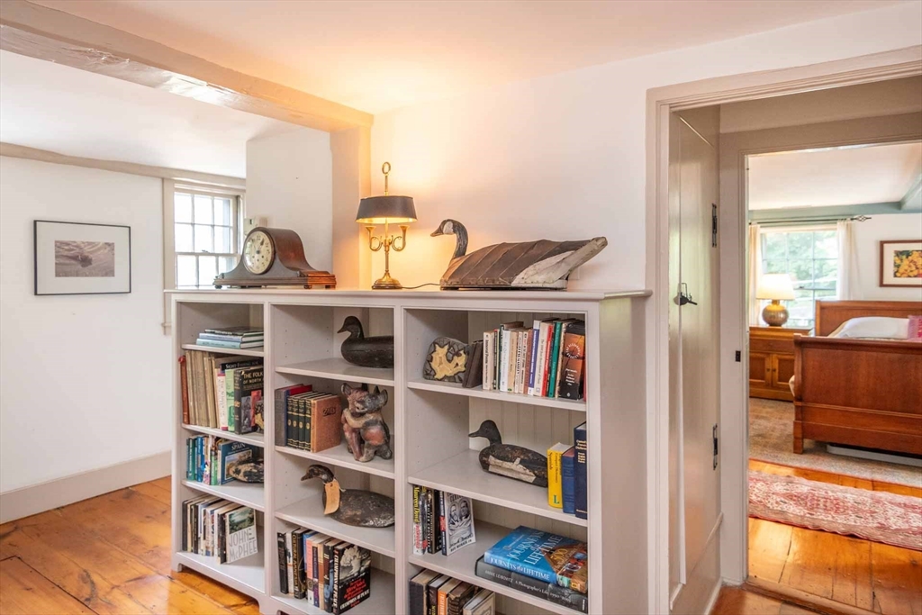 2 Green Avenue Edgartown, MA 02539 - Photo 30 of 42 a view of a book shelf with lots of books
