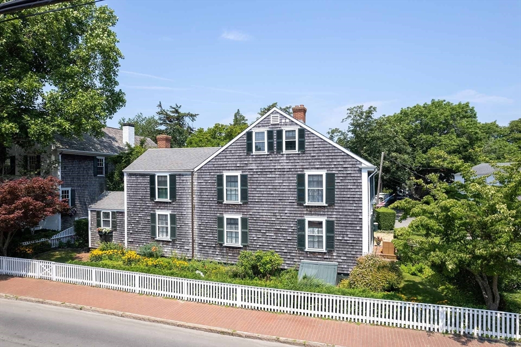 2 Green Avenue Edgartown, MA 02539 - Photo 3 of 42 a front view of a house with a yard