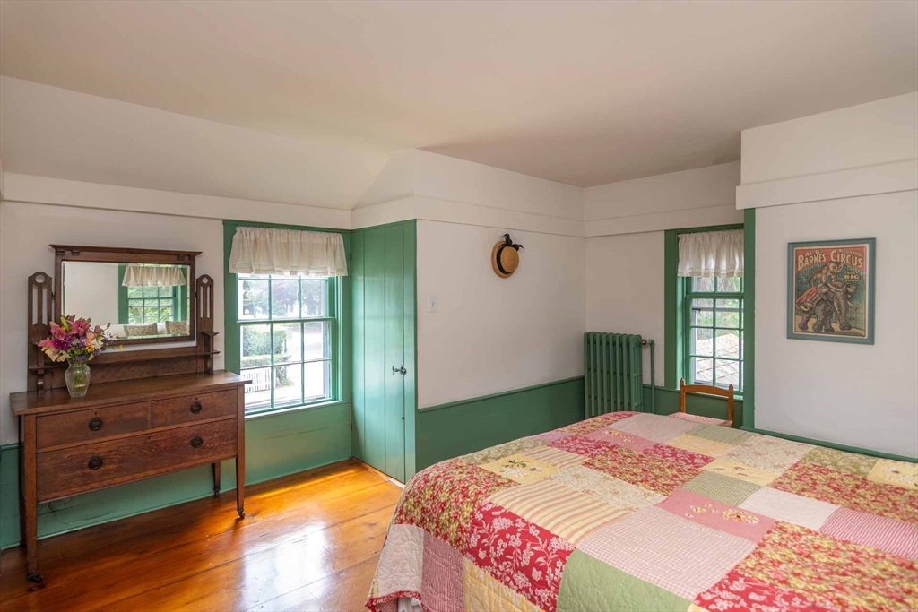 2 Green Avenue Edgartown, MA 02539 - Photo 32 of 42 a bedroom with a bed and a window