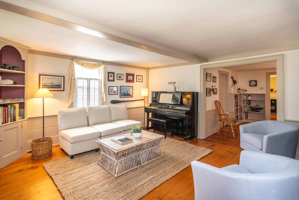 2 Green Avenue Edgartown, MA 02539 - Photo 6 of 42 a living room with furniture and a flat screen tv