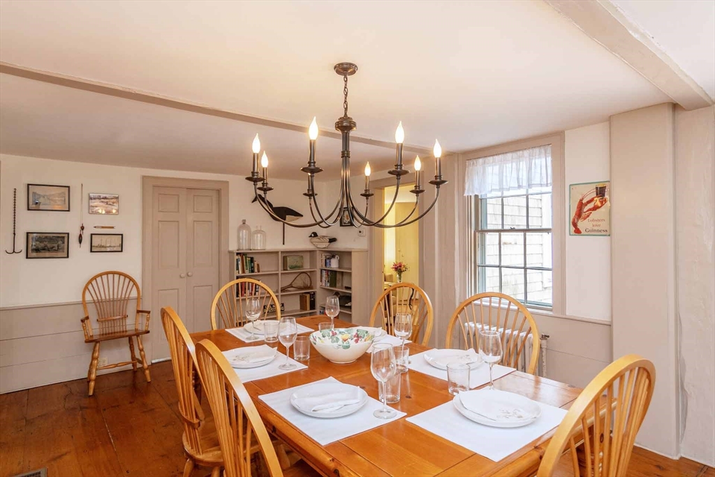 2 Green Avenue Edgartown, MA 02539 - Photo 10 of 42 a view of a dining room with furniture window and wooden floor