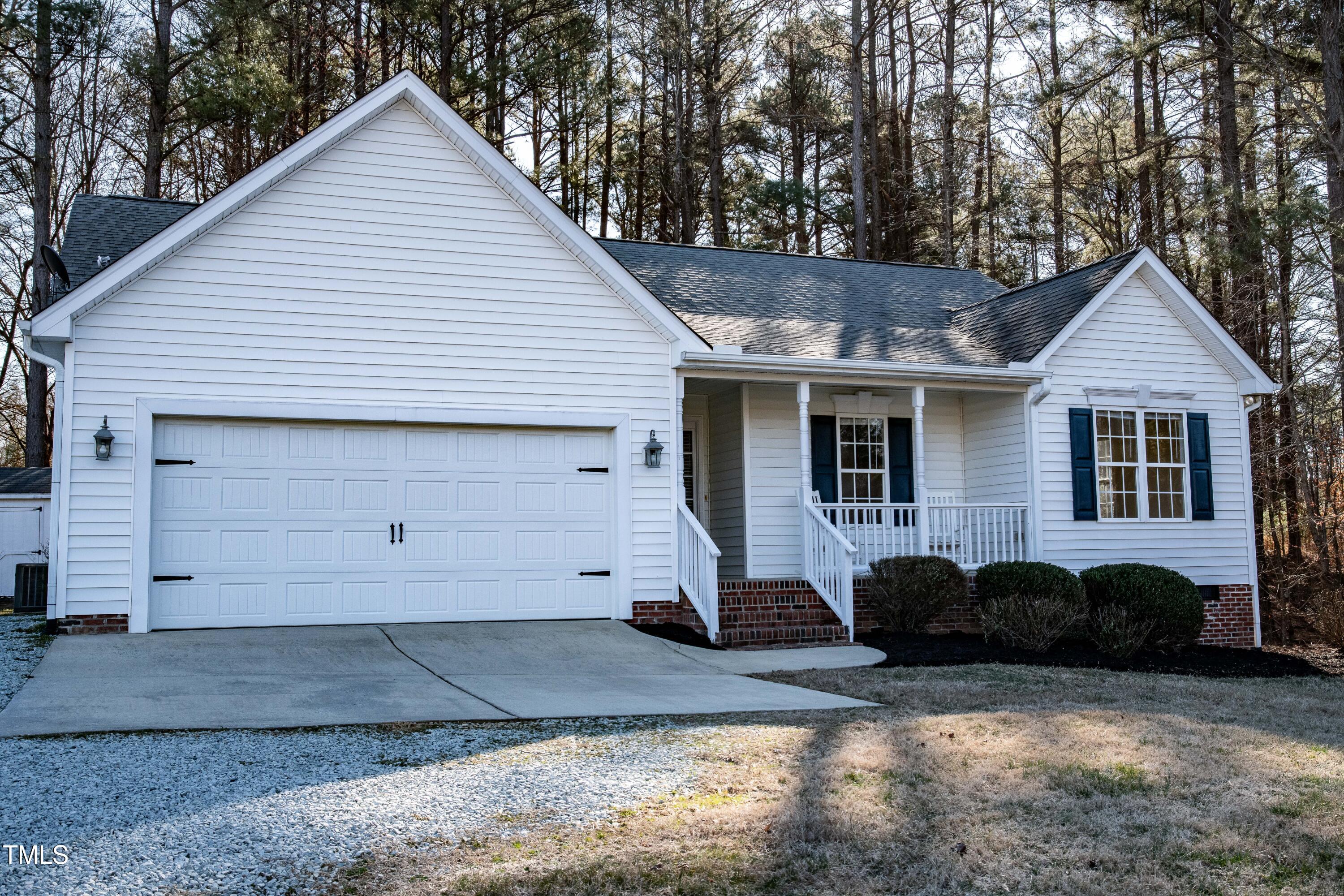 441 Hill Road Rougemont, NC 27572 - Photo 1 of 28 a view of a house with a yard