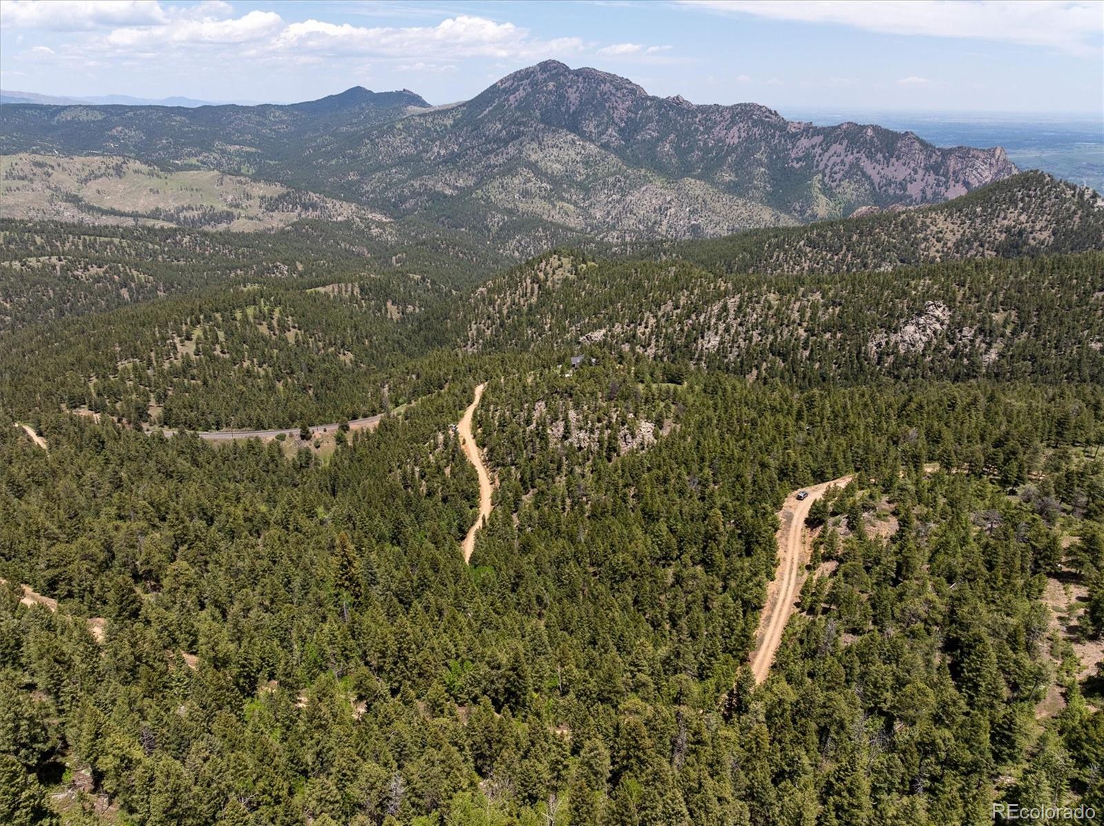 1546 Chute Road Golden, CO 80403 - Photo 27 of 36 an aerial view of mountain with an ocean