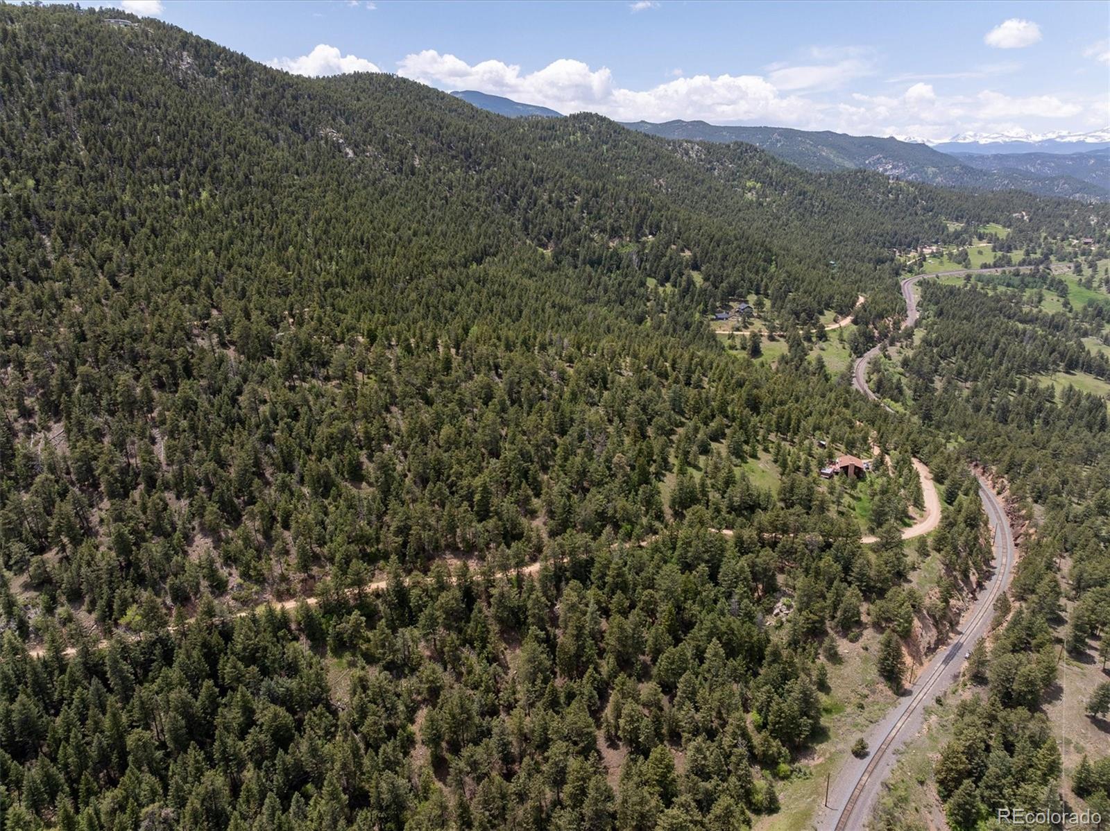 1546 Chute Road Golden, CO 80403 - Photo 29 of 36 a view of a city with mountains